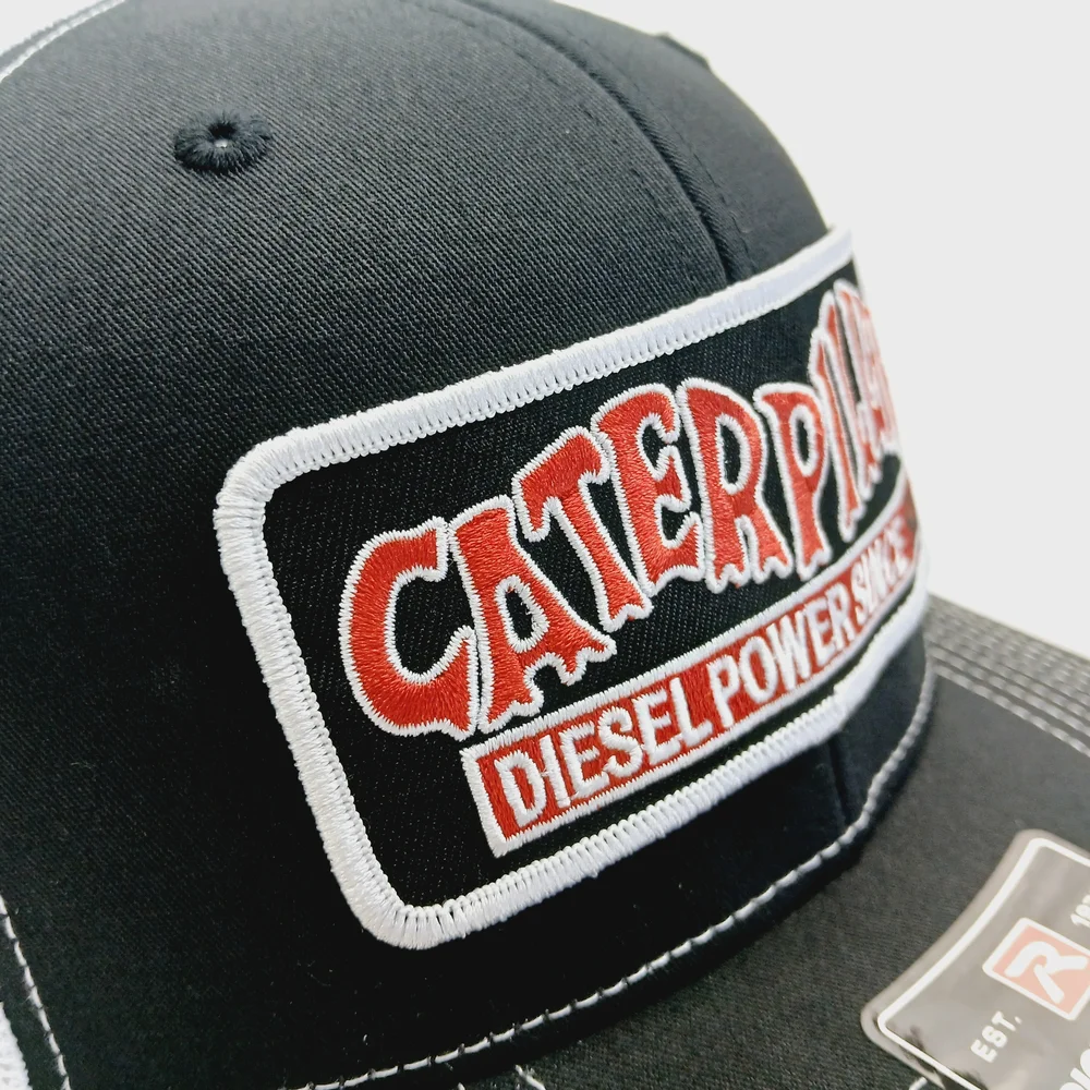 Caterpillar Black and White Trucker Cap